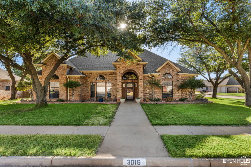 Front view of the home with grand curb appeal