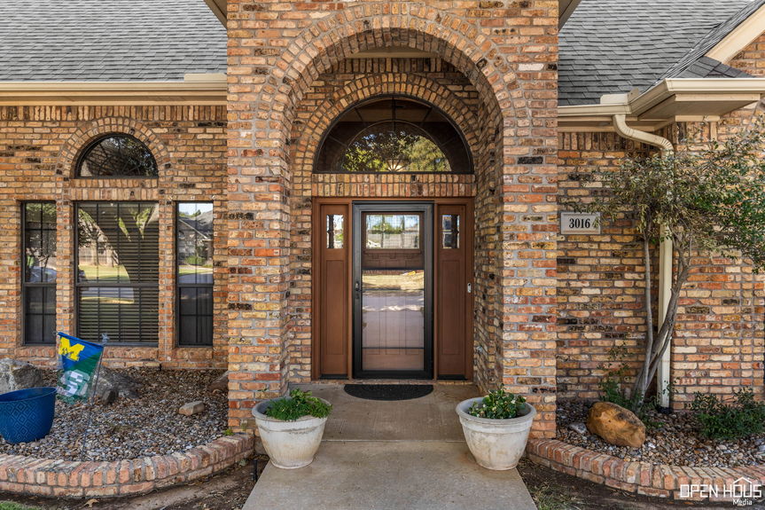 Wide Inviting Walkway and classic arched entrance