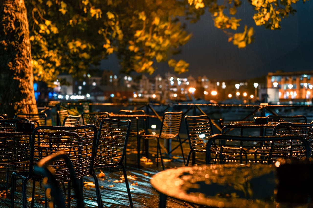 outdoor-cafe-in-a-rainy-evening