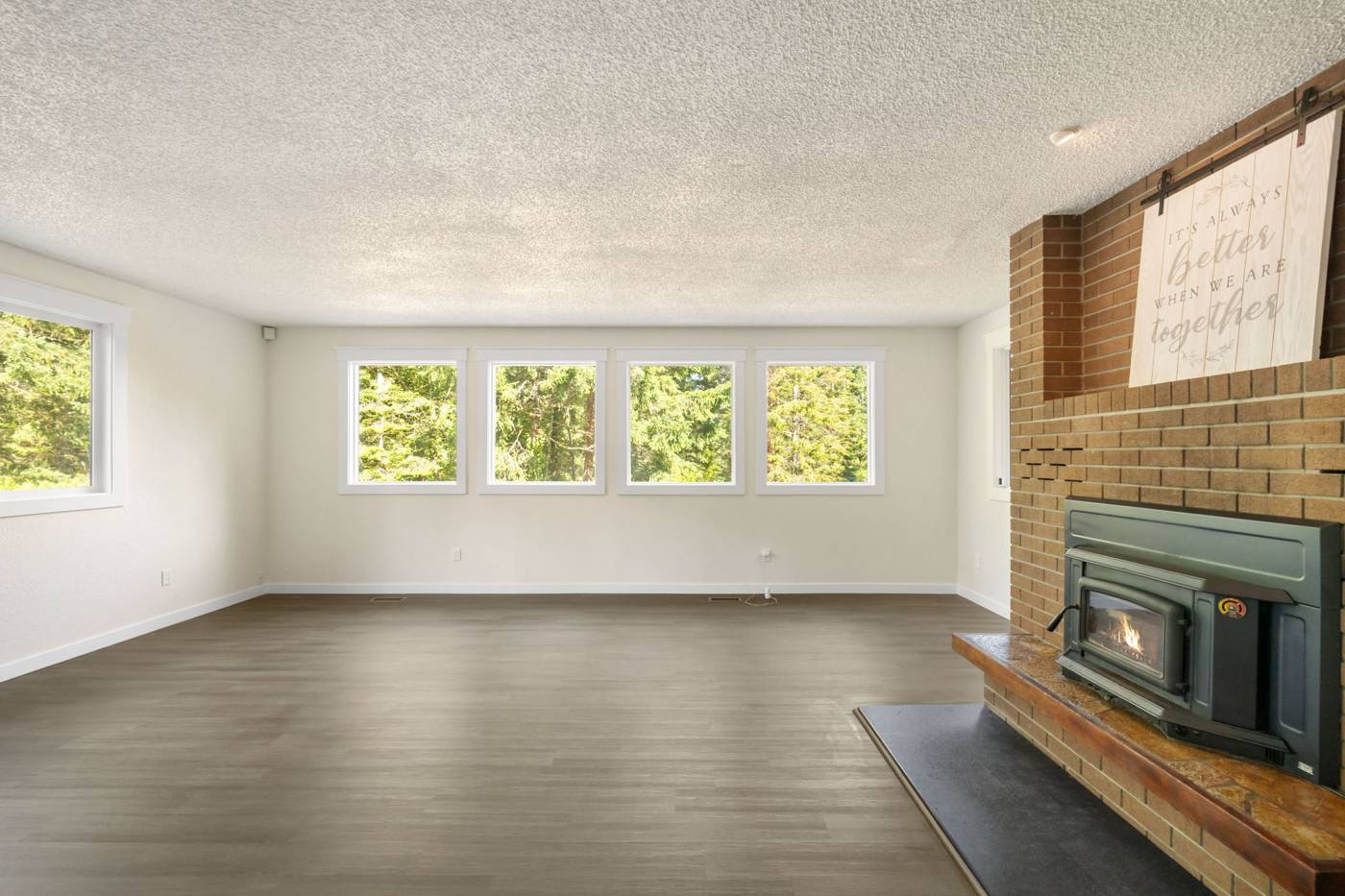 Living room with brick fireplace