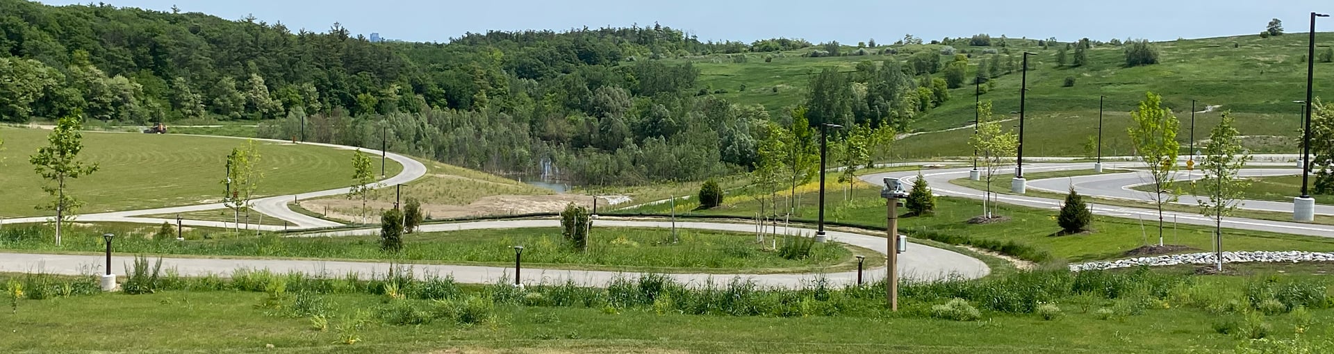 Green hills and winding pathways at North Maple Regional Park in Vaughan