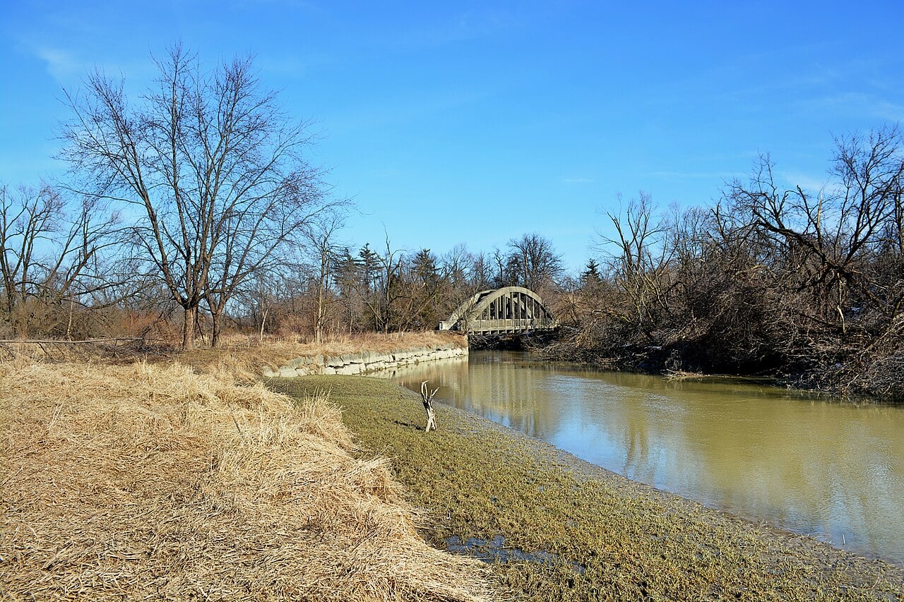 Wooden footbridge over the Humber River at Claireville Conservation Area in Brampton