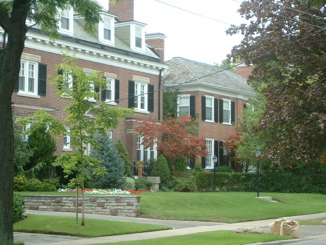 Homes and trees on Warren Road in Toronto Forest Hill, photographed in August 2003