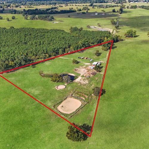 Titus County 8-Acre Horse Property with Arena and Pond