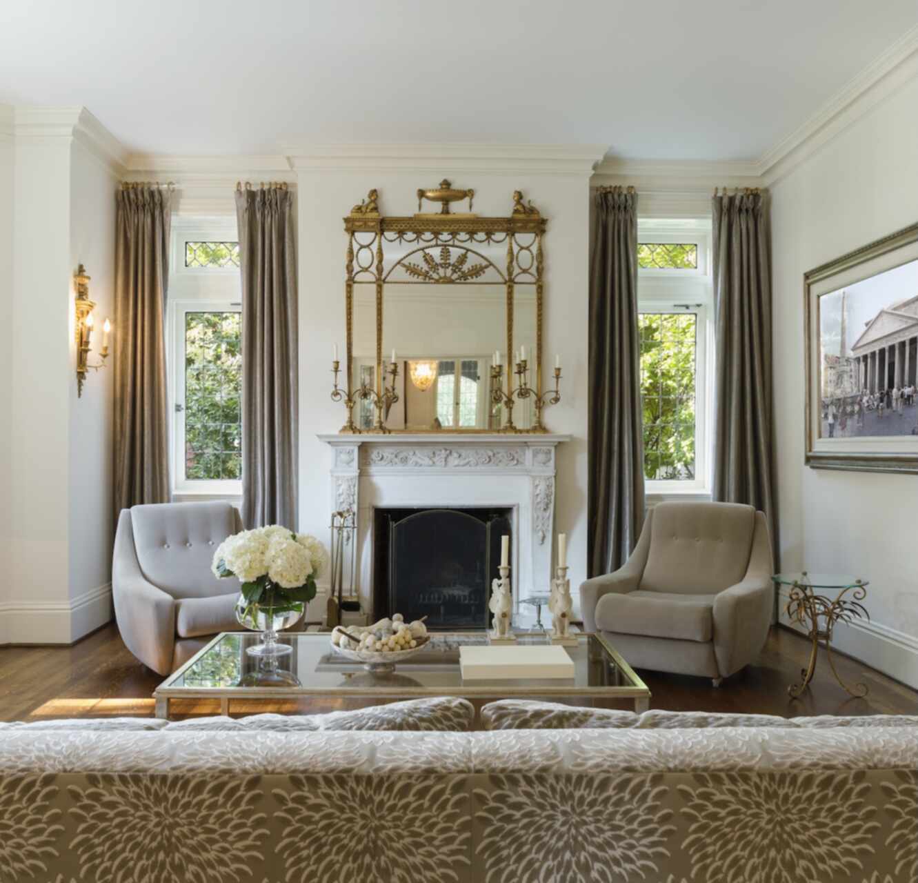Restored Victorian living room with original woodwork and fireplace