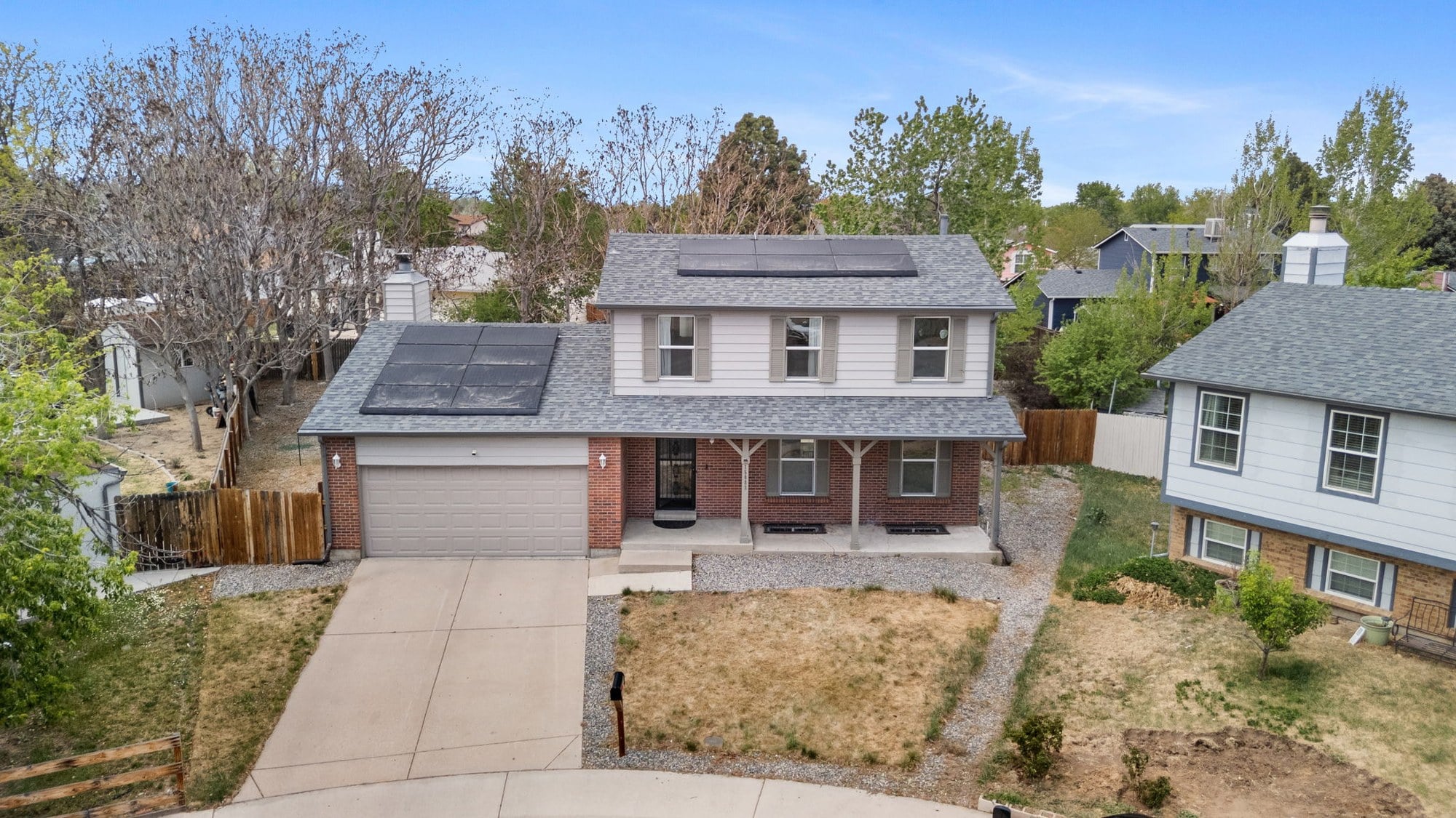 Aerial view of a Denver metro home and lot, ideal for downsizing - FORM at Compass Denver