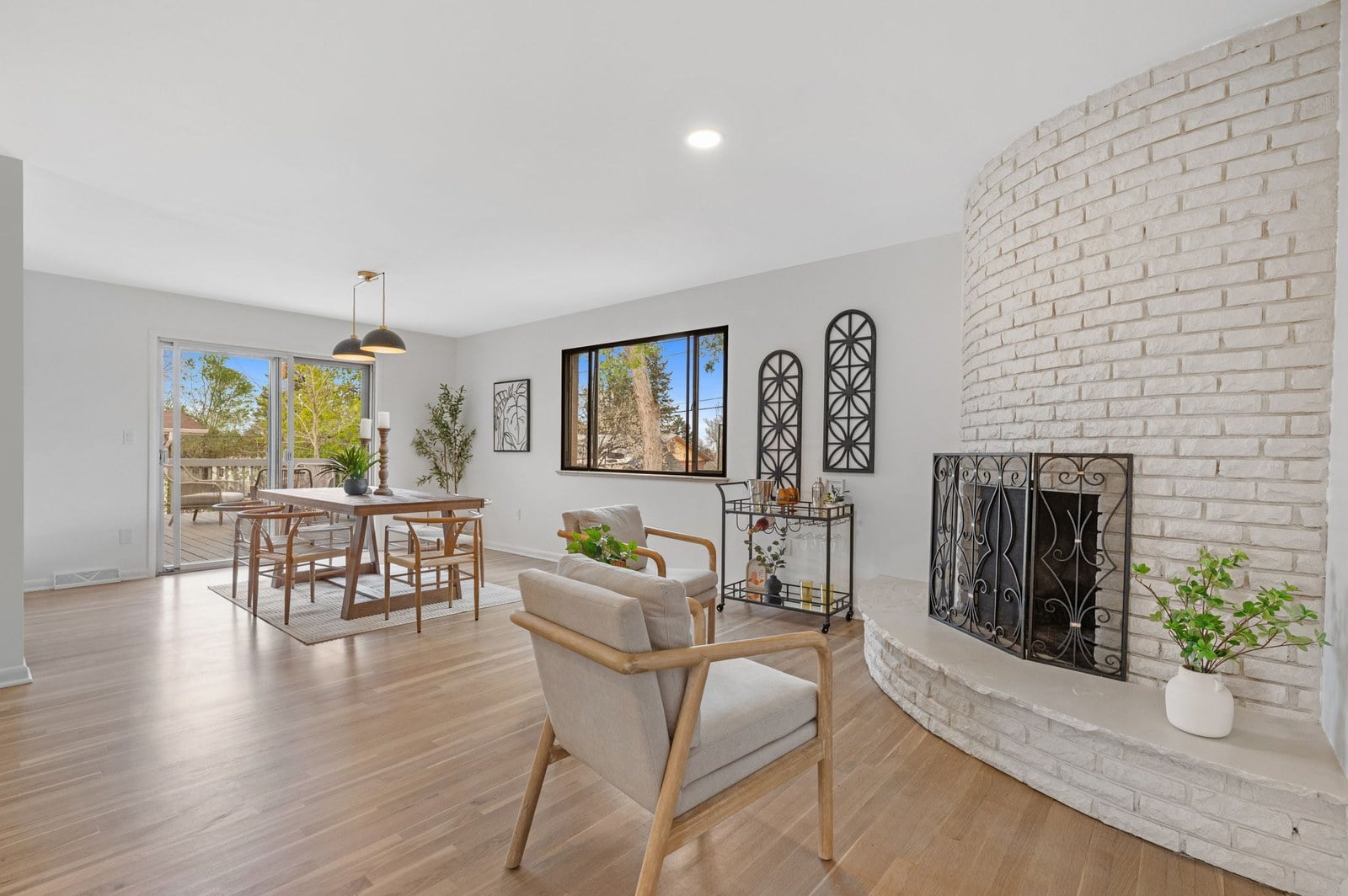 Dining area with fireplace in a Denver home for sale — FORM at Compass