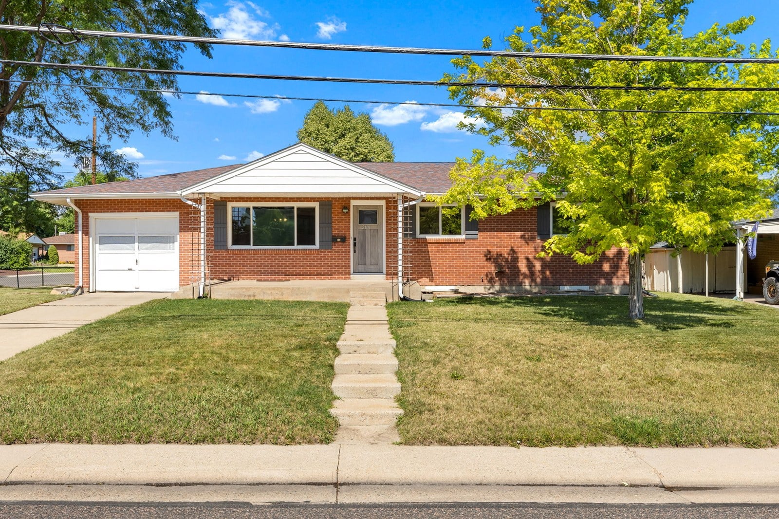 Single-family house with a yard in a nearby Denver neighborhood | FORM at Compass