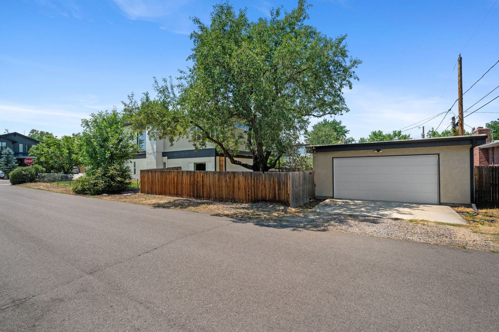 Private fenced backyard with 2024 deck at 3801 W Alice Pl in Berkeley, Denver