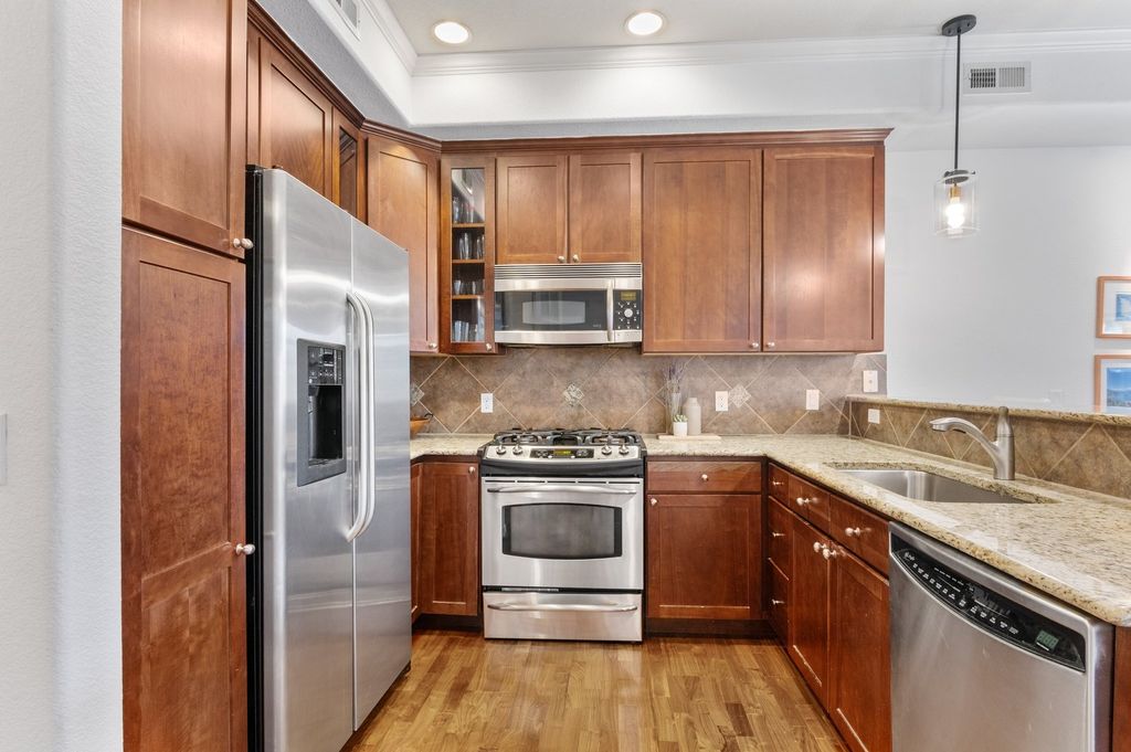 Original wood-cabinet kitchen in an Applewood mid-century home, a candidate for a minor refresh rather than a full gut remodel