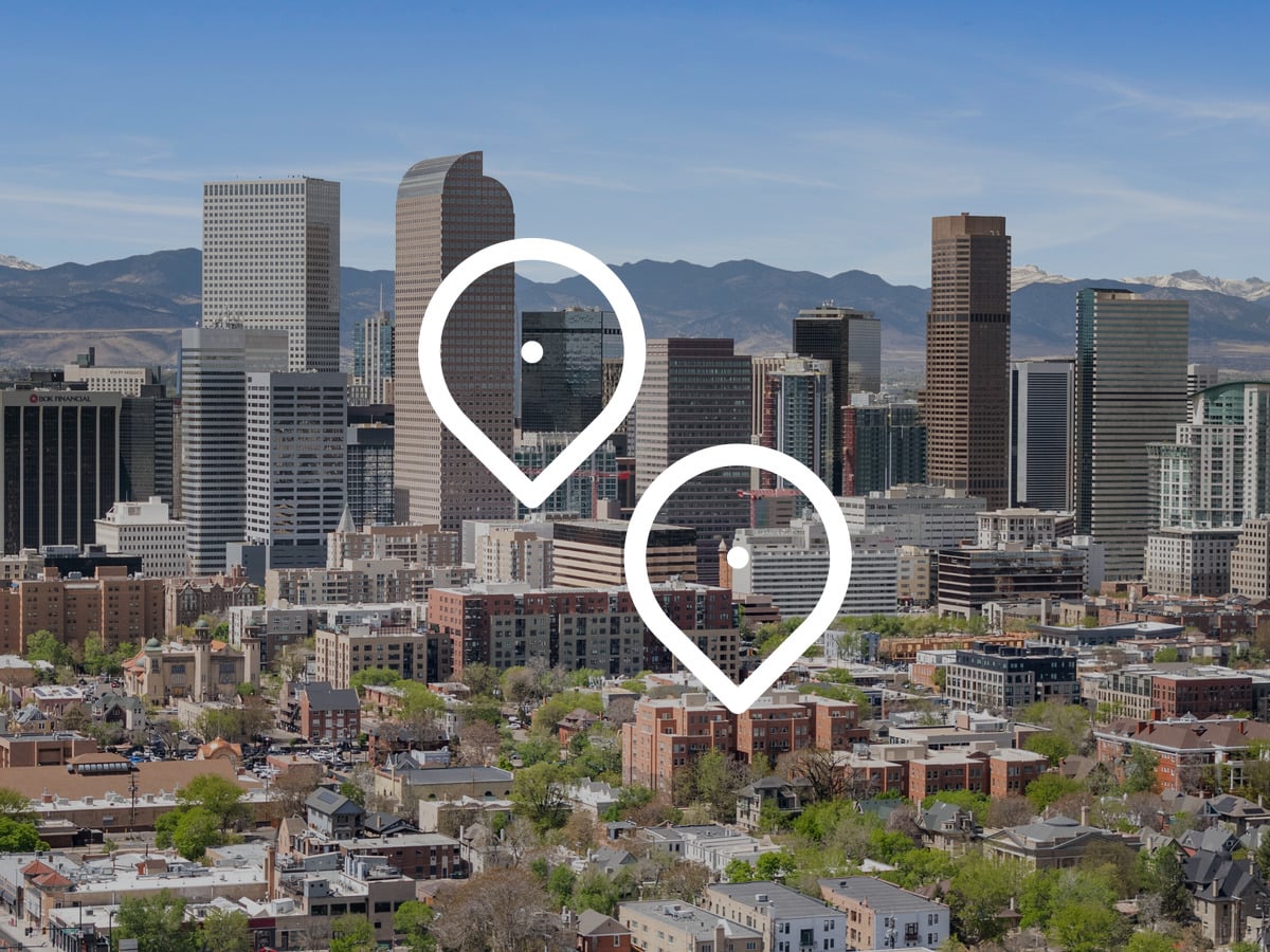 Denver skyline and central neighborhoods seen from Sloan's Lake, illustrating how to choose a Denver neighborhood by budget and lifestyle