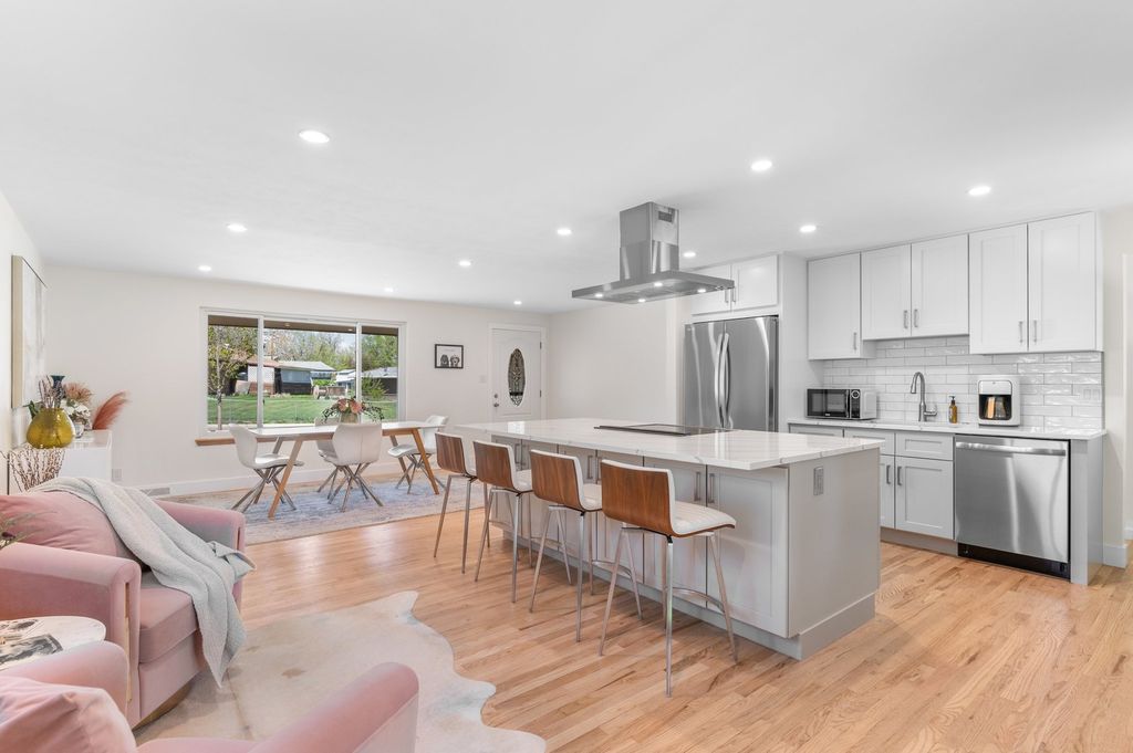 Staged kitchen with an island prepared for a Denver spring listing