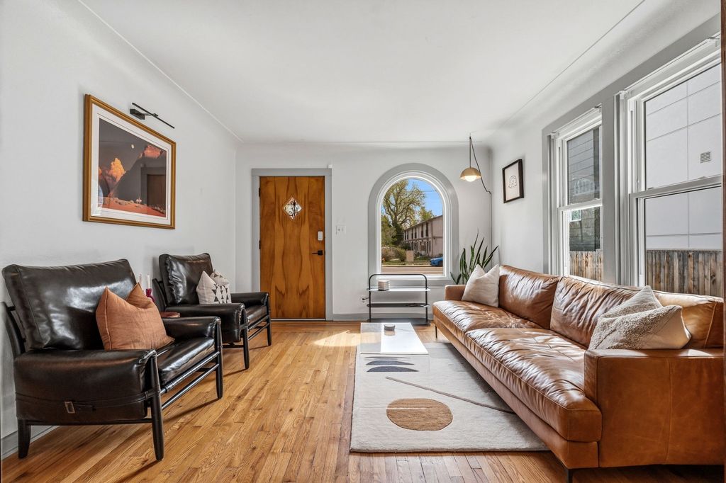 Staged living room prepared for a spring listing in a central Denver neighborhood