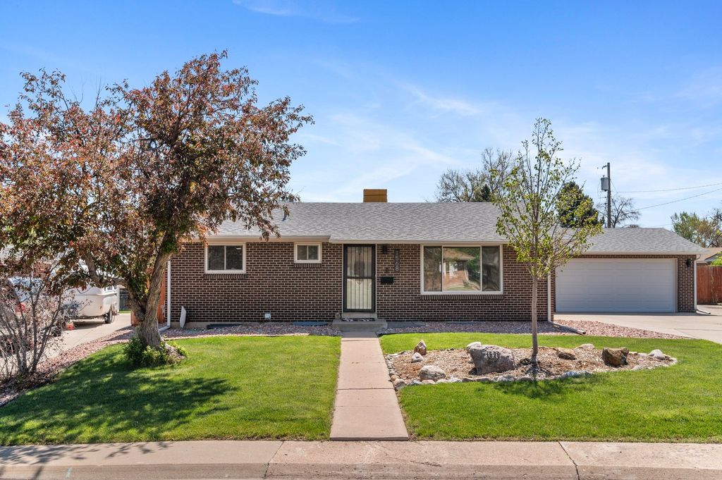 Brick ranch home with mature trees in the Golden, Colorado area
