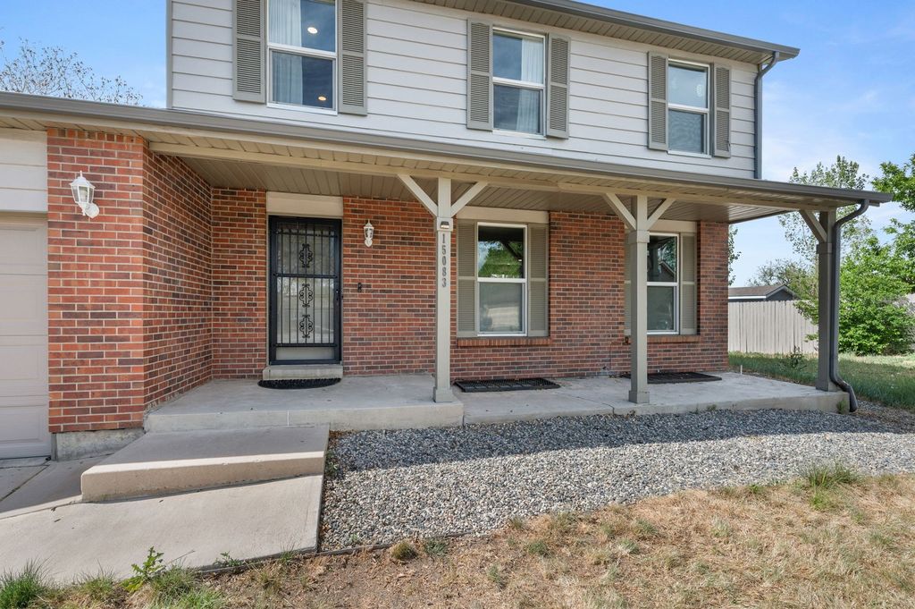 Brick two-story home with a covered front porch in Golden, Colorado, the fastest-moving in-town segment