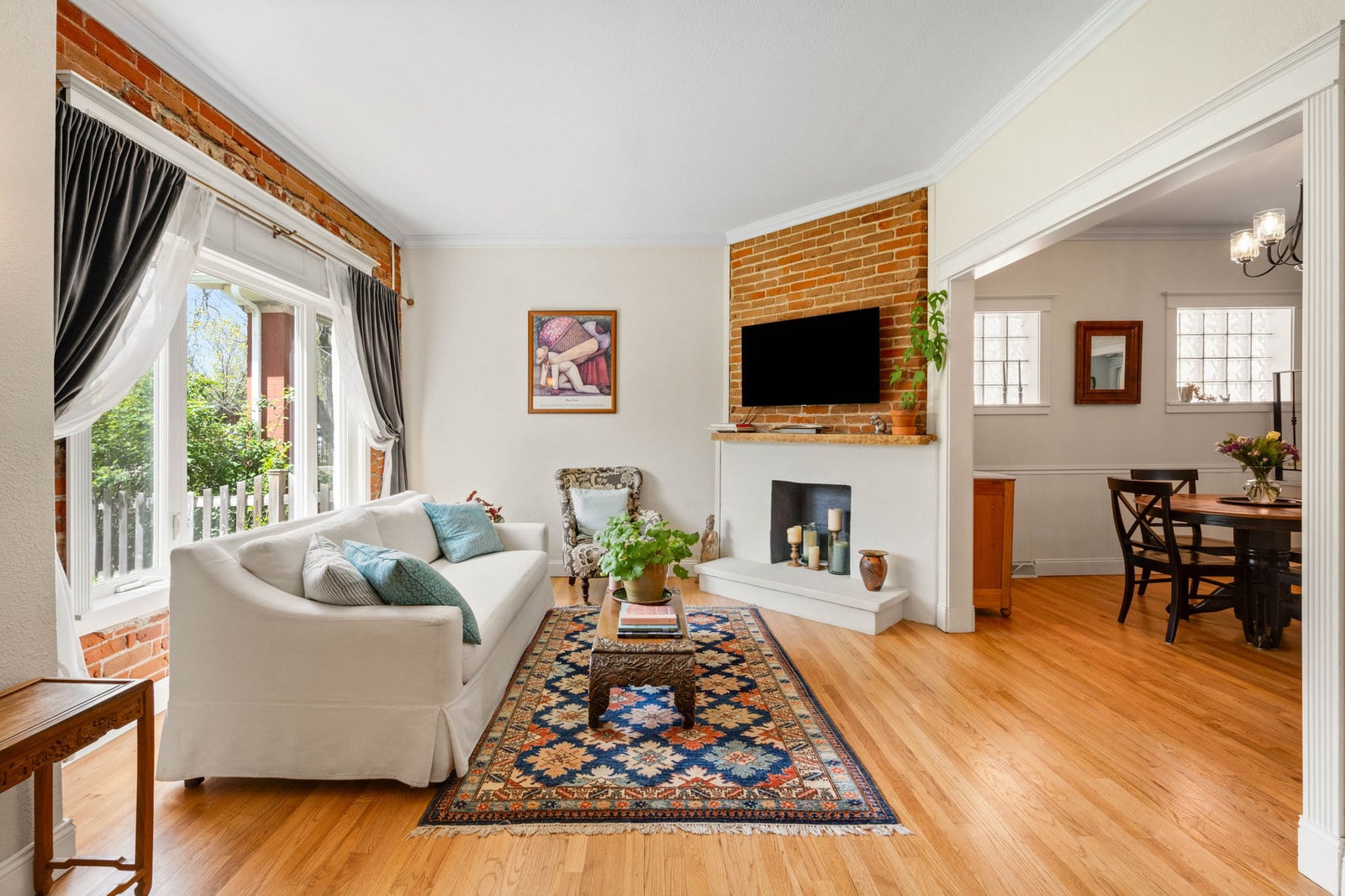 Living room with fireplace in a pre-war Denver home near Washington Park