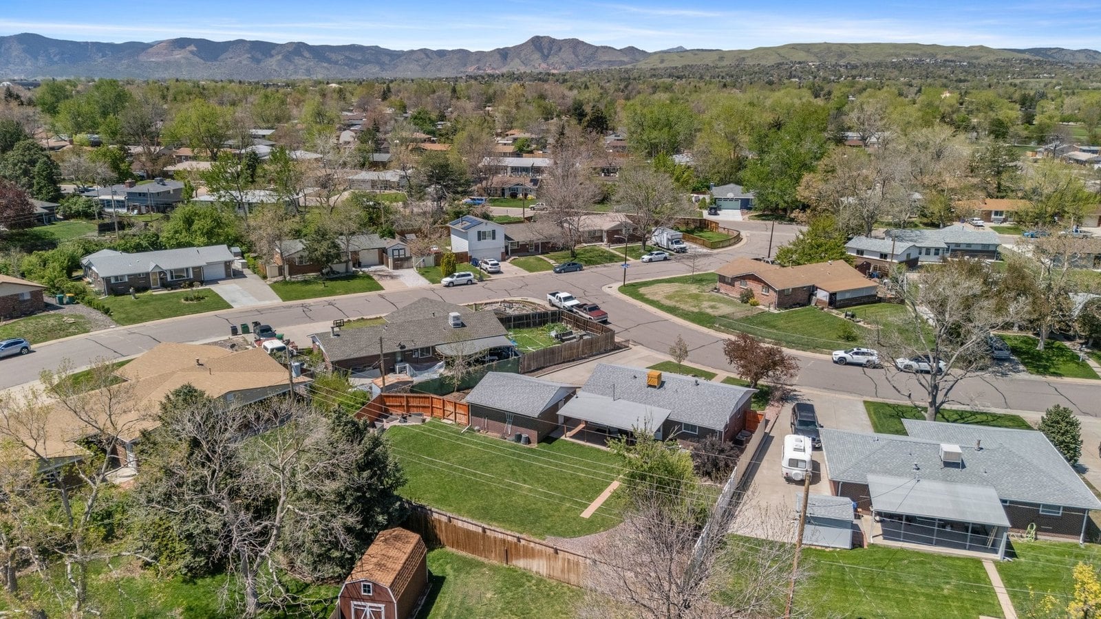 Aerial view of west Denver metro neighborhoods toward the foothills near Applewood