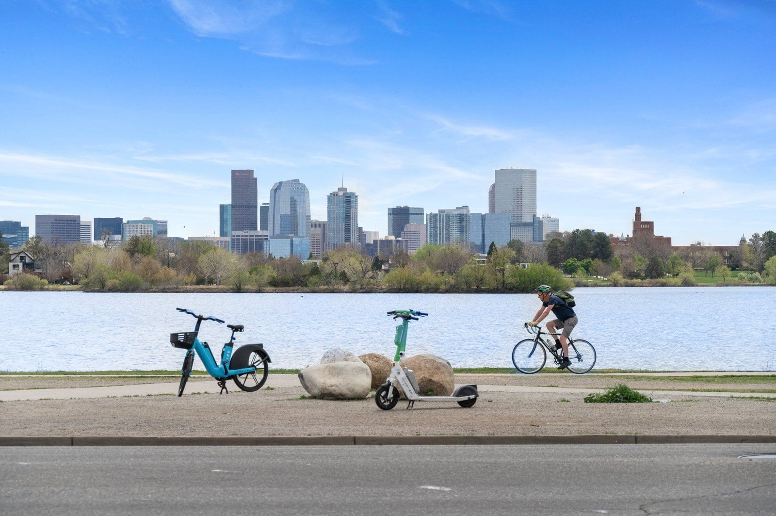 Bike path along Sloan's Lake with the downtown Denver skyline behind it, Denver, Colorado