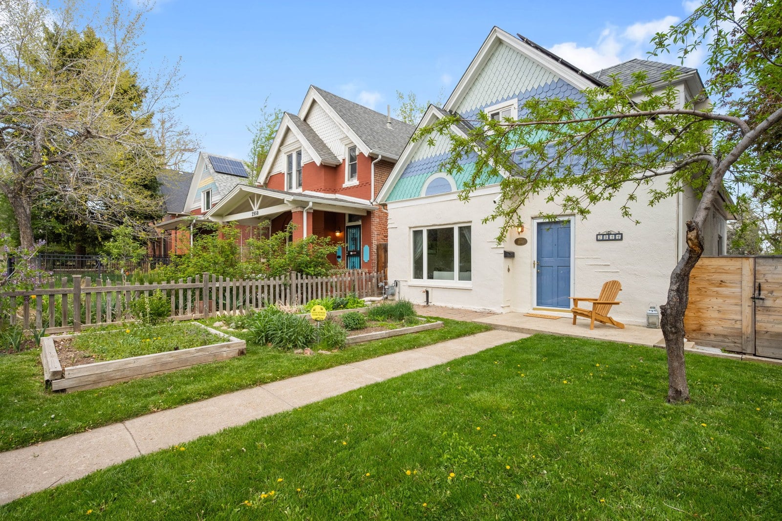 Victorian cottages behind a picket fence in the Highlands, West Highland, Denver, Colorado