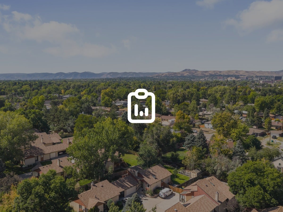 Aerial view of Wheat Ridge, Colorado homes with the front range in the distance