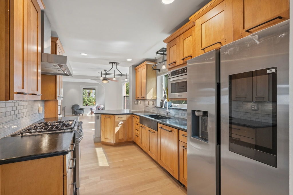 Remodeled main level kitchen with soapstone countertops at 4581 Bryant St in Sunnyside, Denver