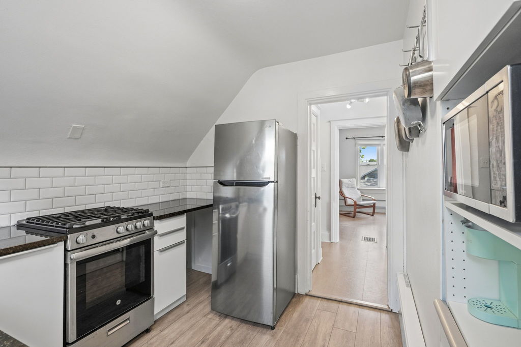 Kitchen in the separate upper level unit at 4581 Bryant St in Sunnyside, Denver