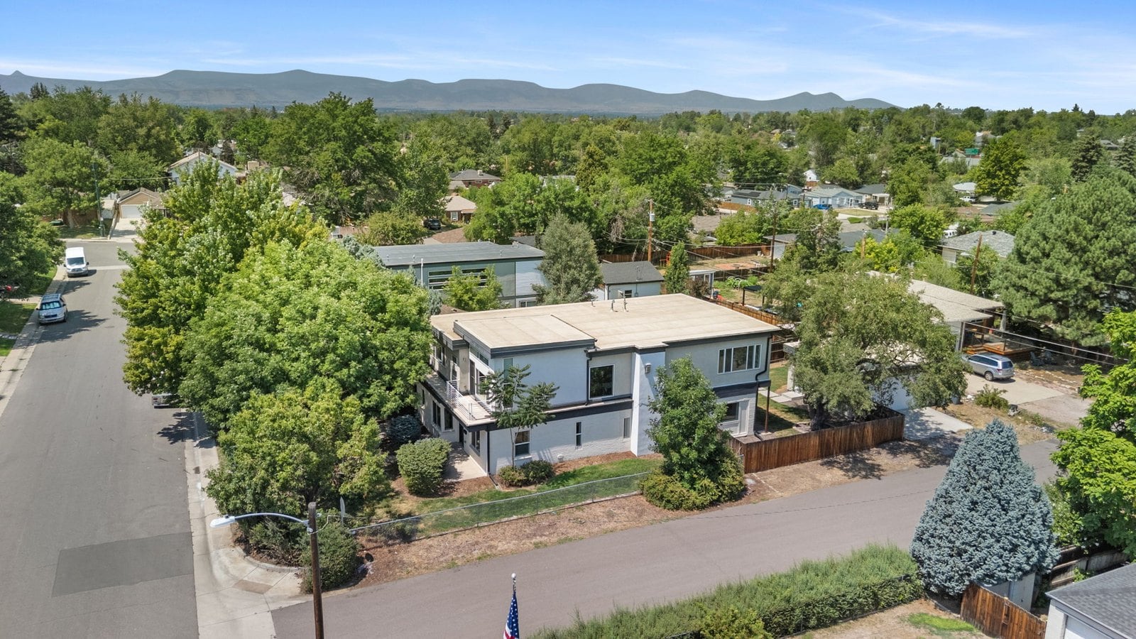 Aerial of Berkeley neighborhood homes in northwest Denver with mountain views