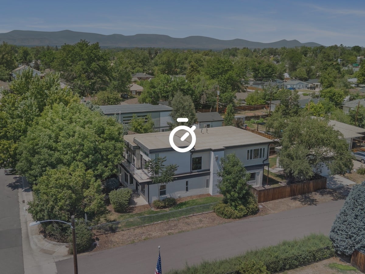 Aerial view of a Berkeley neighborhood block in Denver, Colorado with the foothills beyond, September 2026 market update