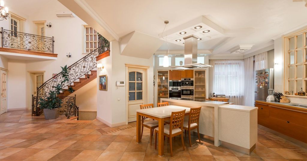 Renovated kitchen blending historic trim with contemporary finishes.