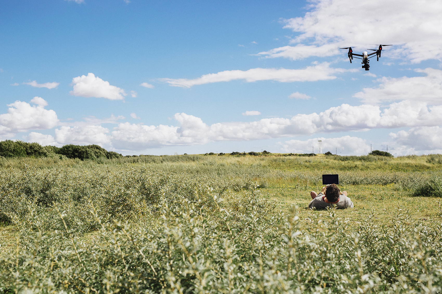 man-flying-drone-using-remote-control-2024-10-11-11-37-27-utc