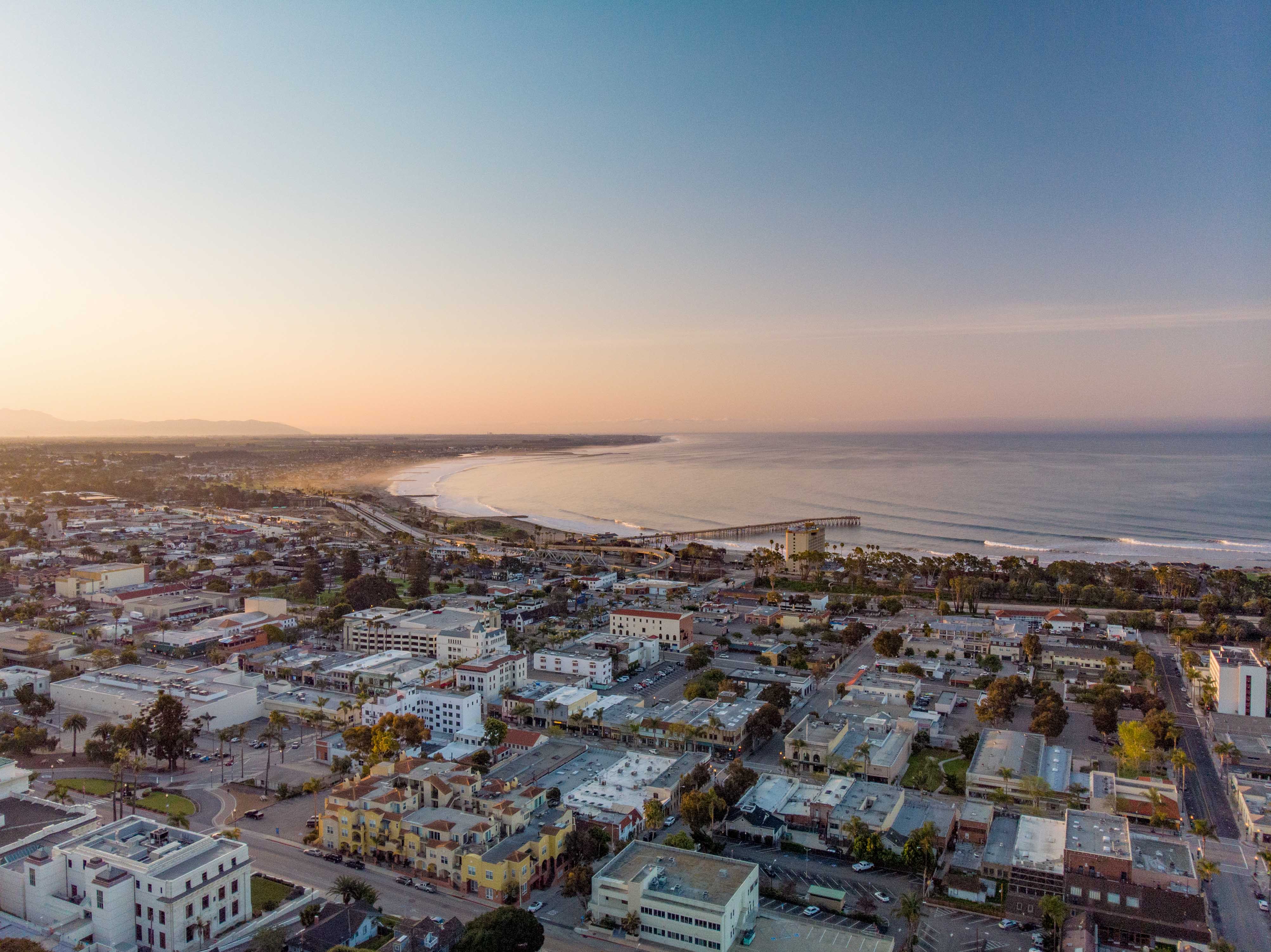 Aerial view of Ventura coastline, downtown, and pier at golden hour