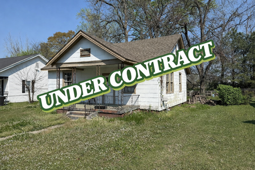 House under contract in sunny yard