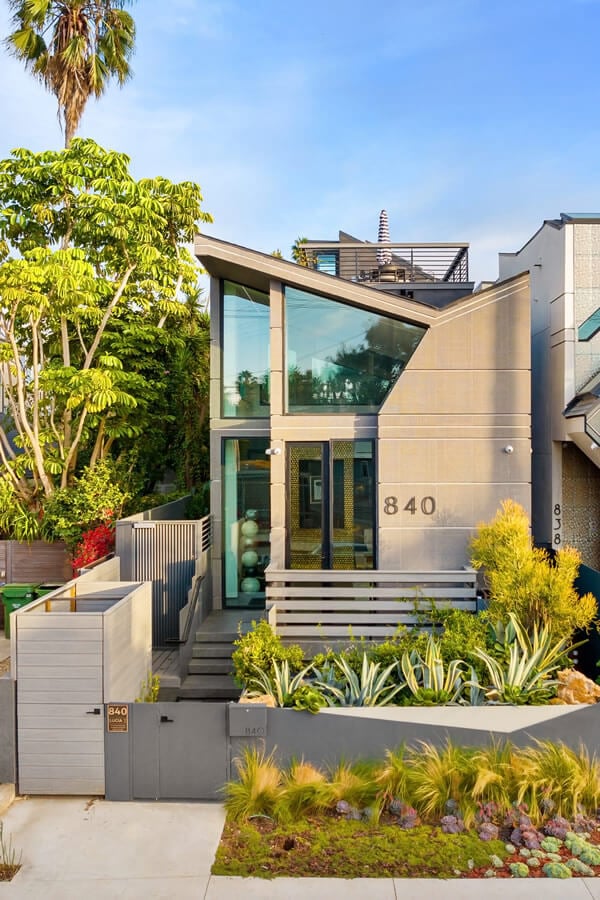 contemporary-house-with-lush-greenery-in-bright-su-2024-03-26-22-28-25-utc (1)