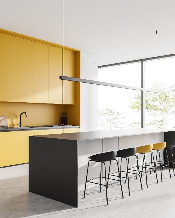 hite kitchen interior with bar chairs