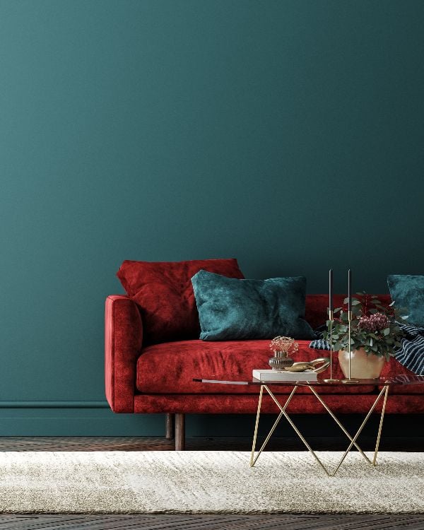 Home interior with red sofa, table and decor in green living room(small)