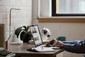 hands-typing-laptop-keyboard