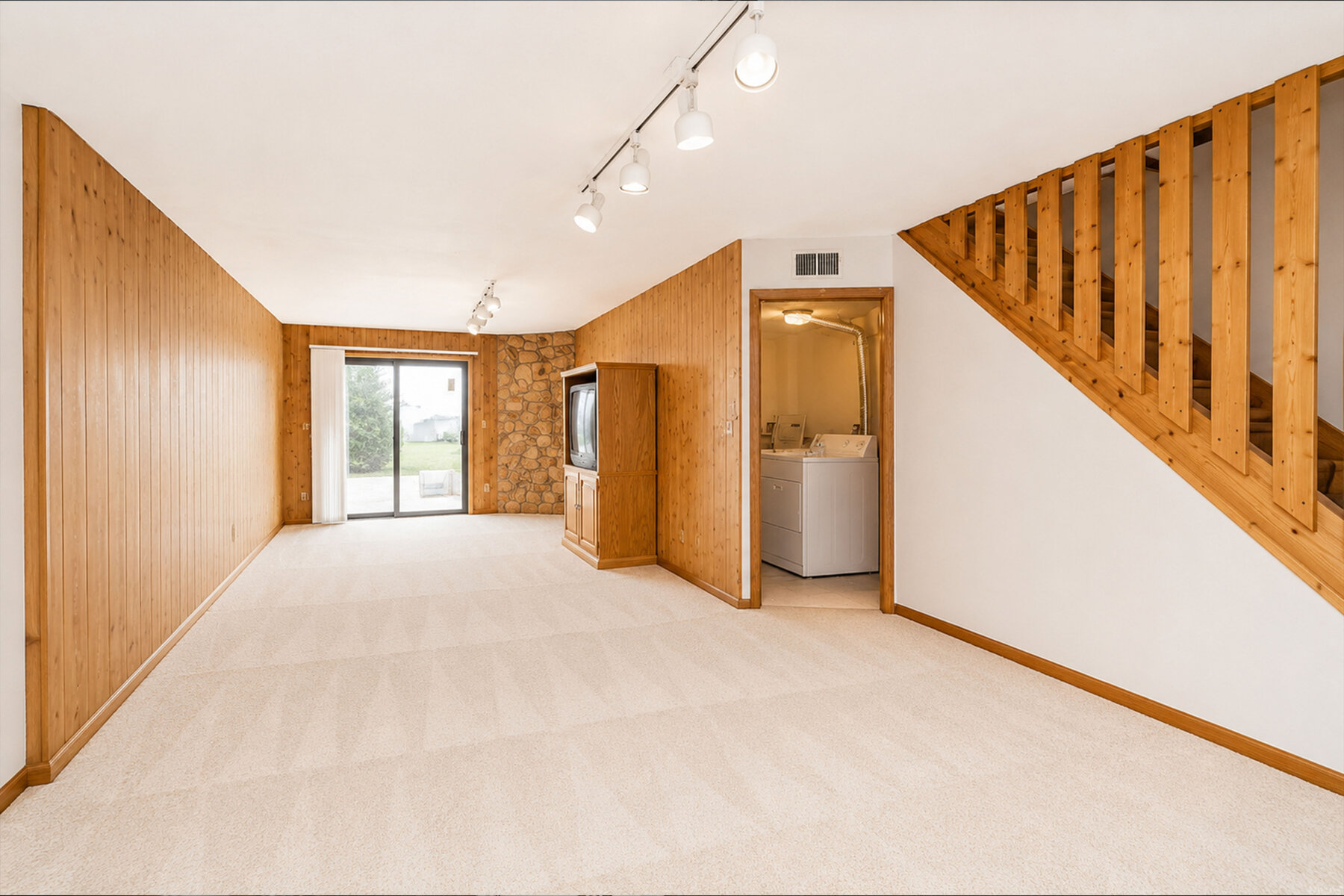 29 Wood Court Lower Level Rec Room With Stone Wall