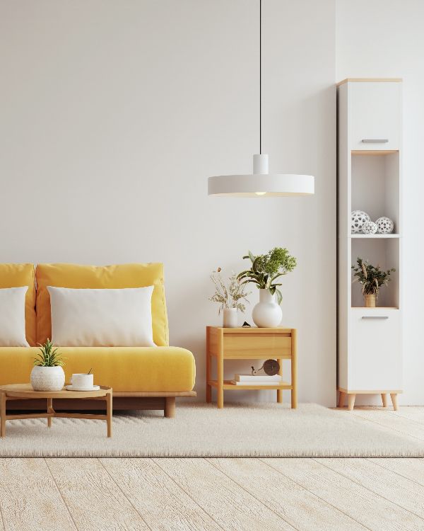 cozy living room features a yellow couch