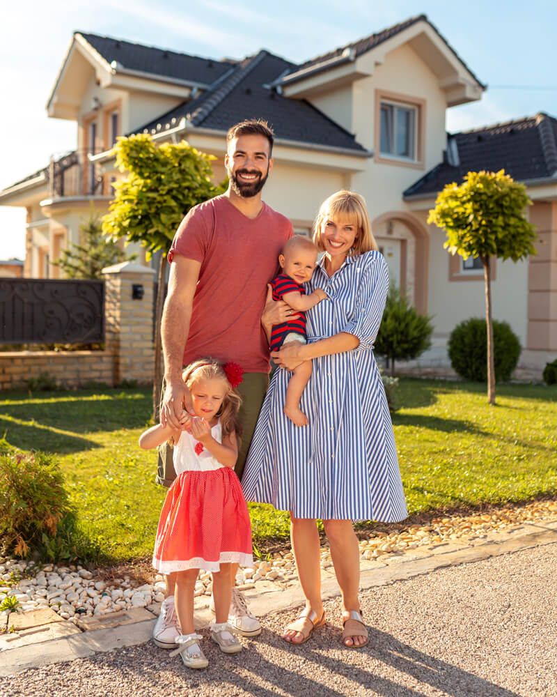 parents-and-children-standing-in-front-of-their-ne-2023-11-27-05-04-08-utc (2)