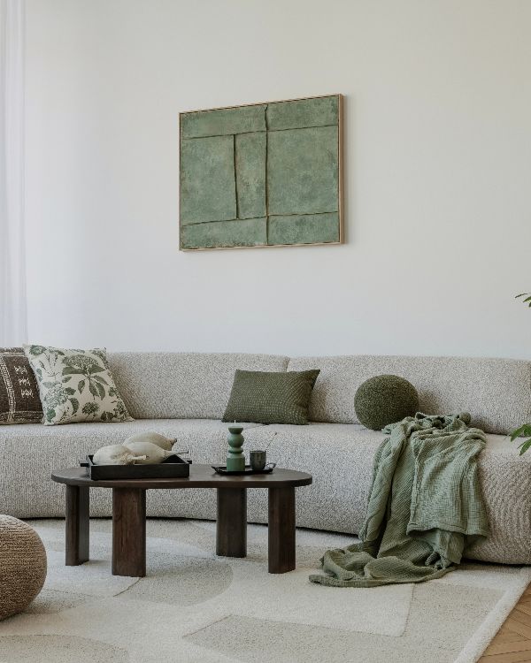 A modern, minimalist interior with a large sofa(1)