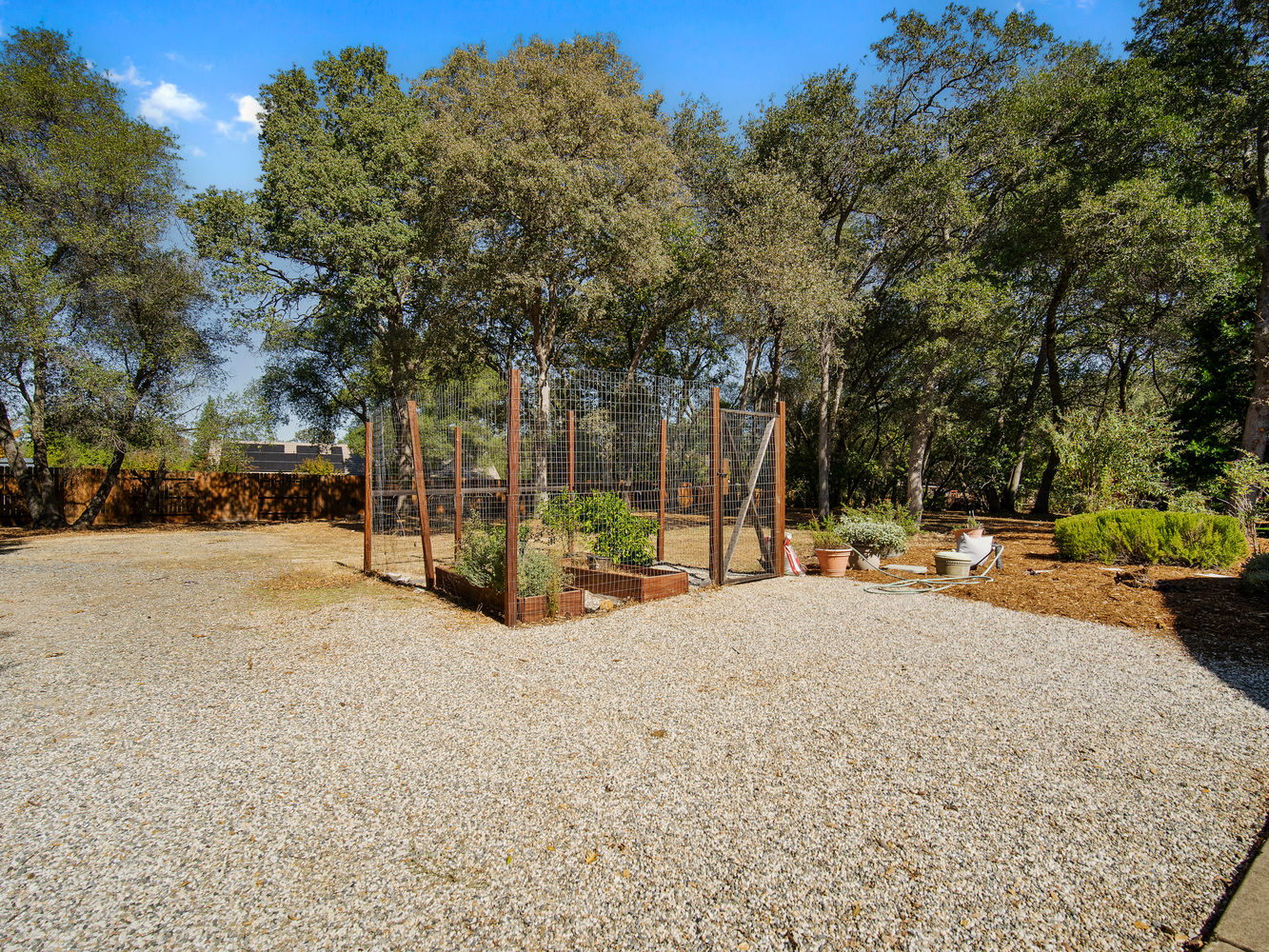 3720_WhisperingPinesLane_Ext_Rear_1_02