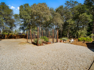 3720_WhisperingPinesLane_Ext_Rear_1_02