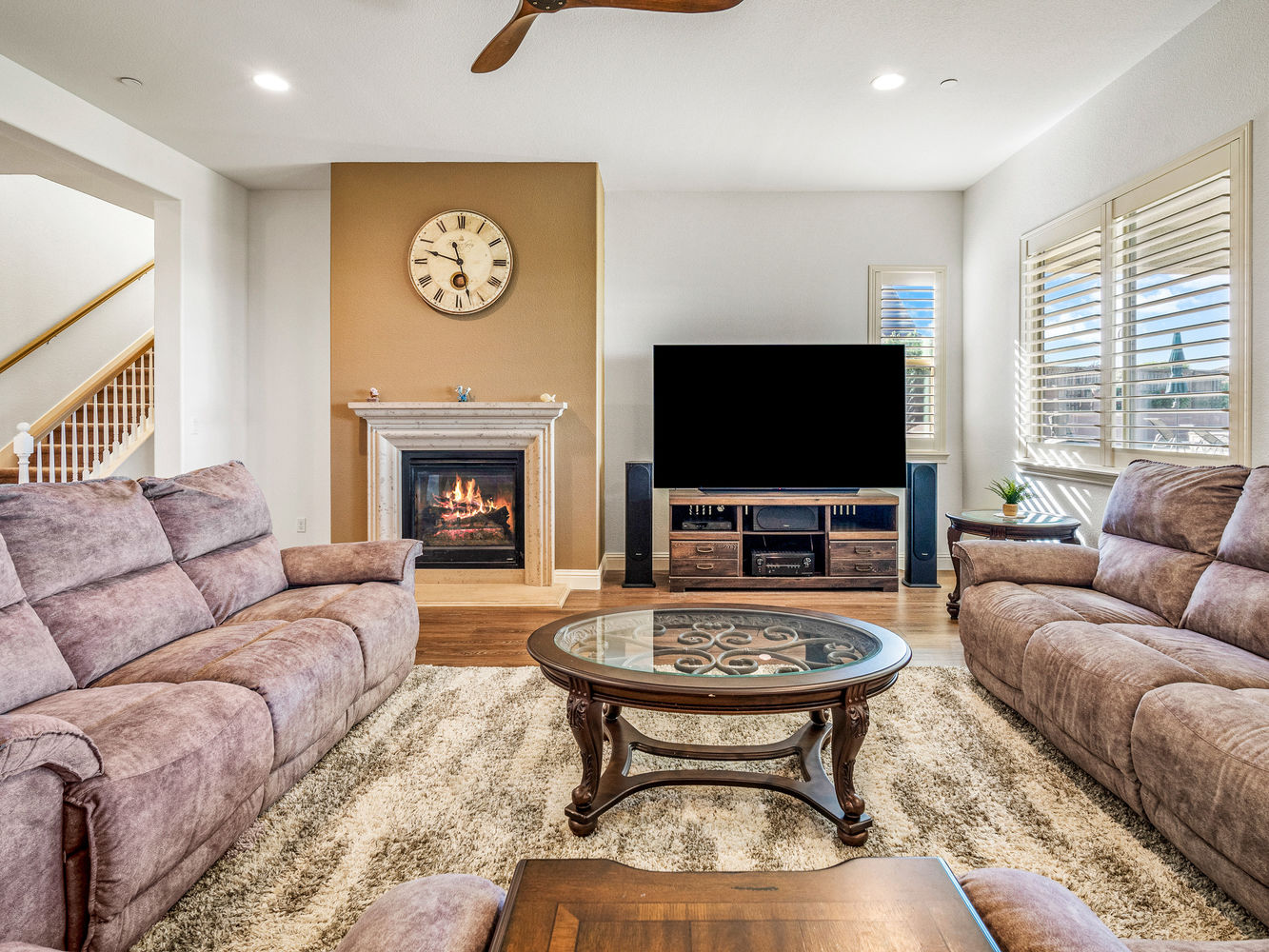 314_CobbleRockCourt_Int_FamilyRoom_1_02_WithFire