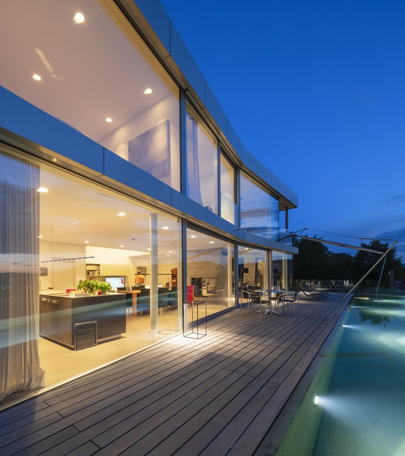 switzerland-lighted-modern-villa-at-dusk-with-ter-2024-09-17-14-16-41-utc