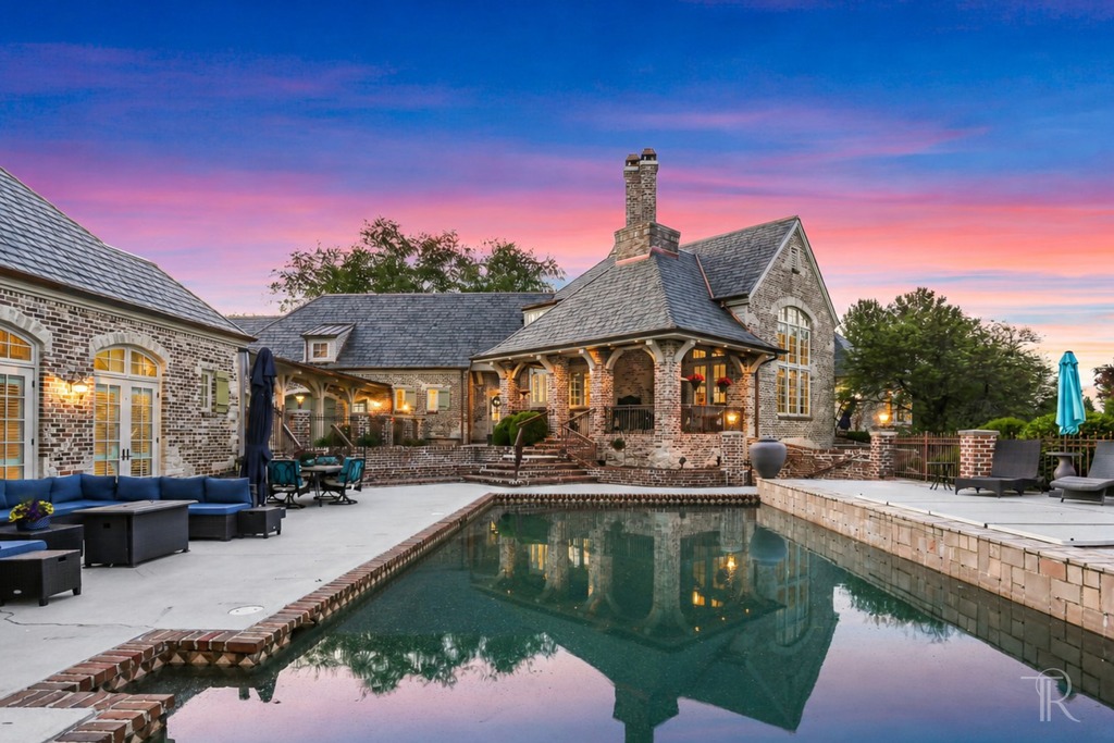 Luxury Home Near St. Louis with pool, guest house and waterfront private lake access.