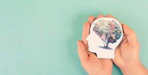 hands-holding-head-brain