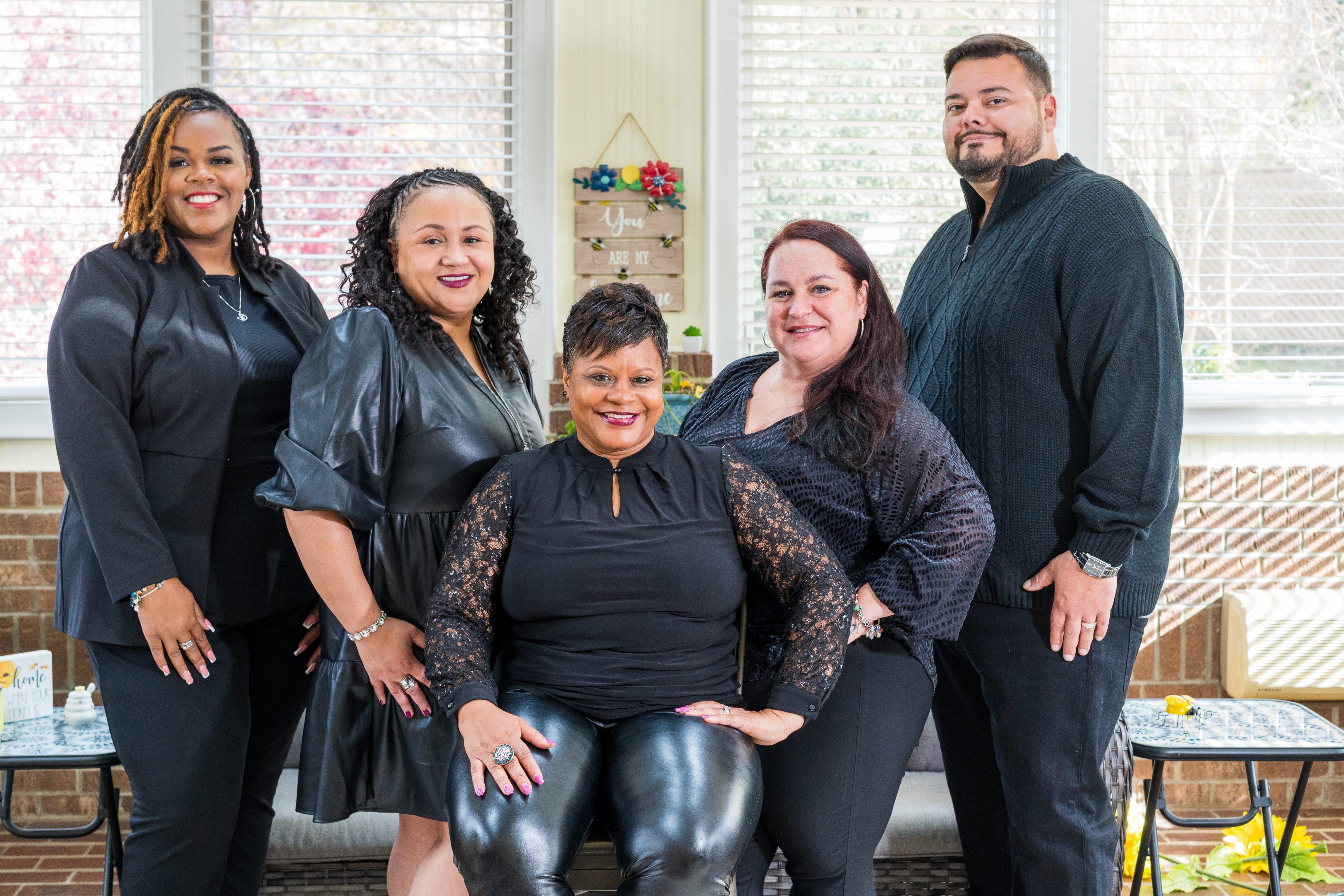 ua all black in sunroom me sitting down (1)