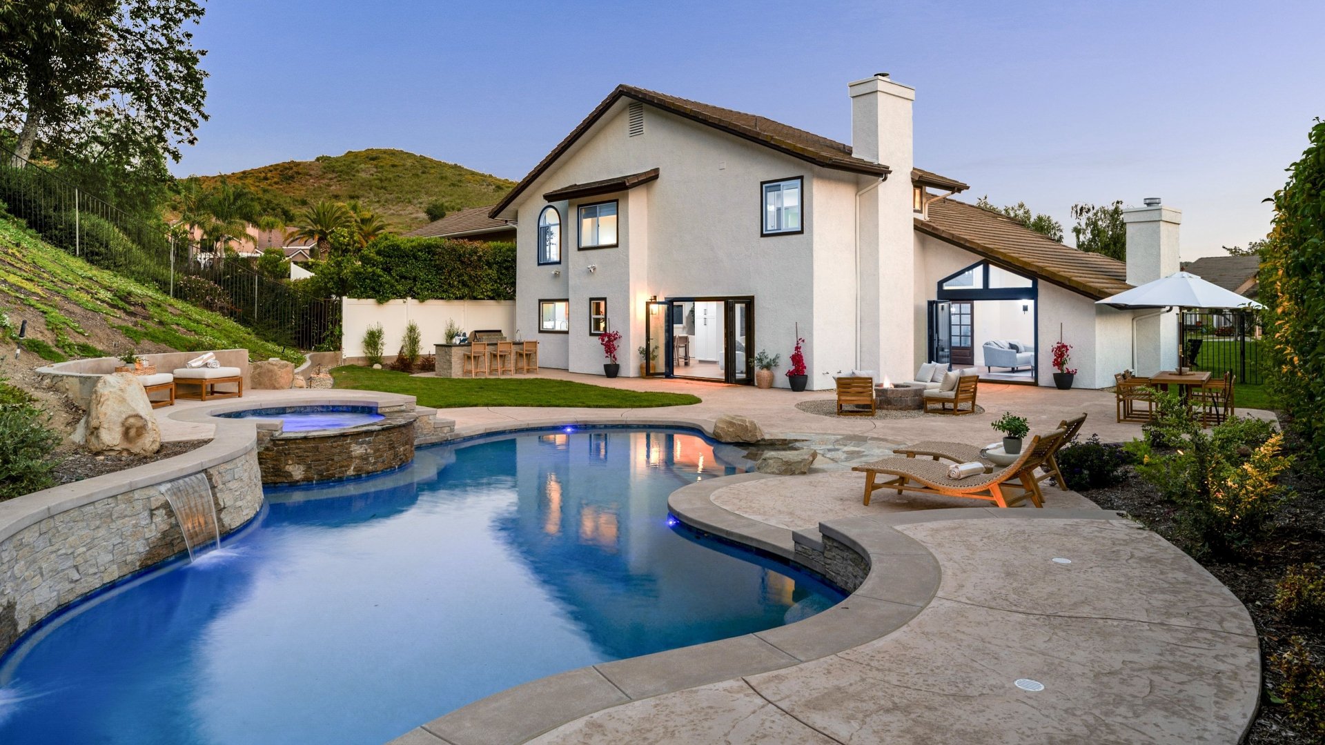 Modern luxury house with a swimming pool and patio