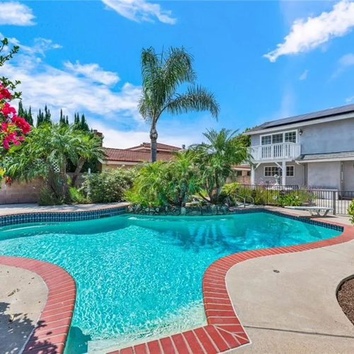 Rare Dual-Master Pool Home in the Heart of Orange – Corner Lot, Remodeled, and Move-In Ready!