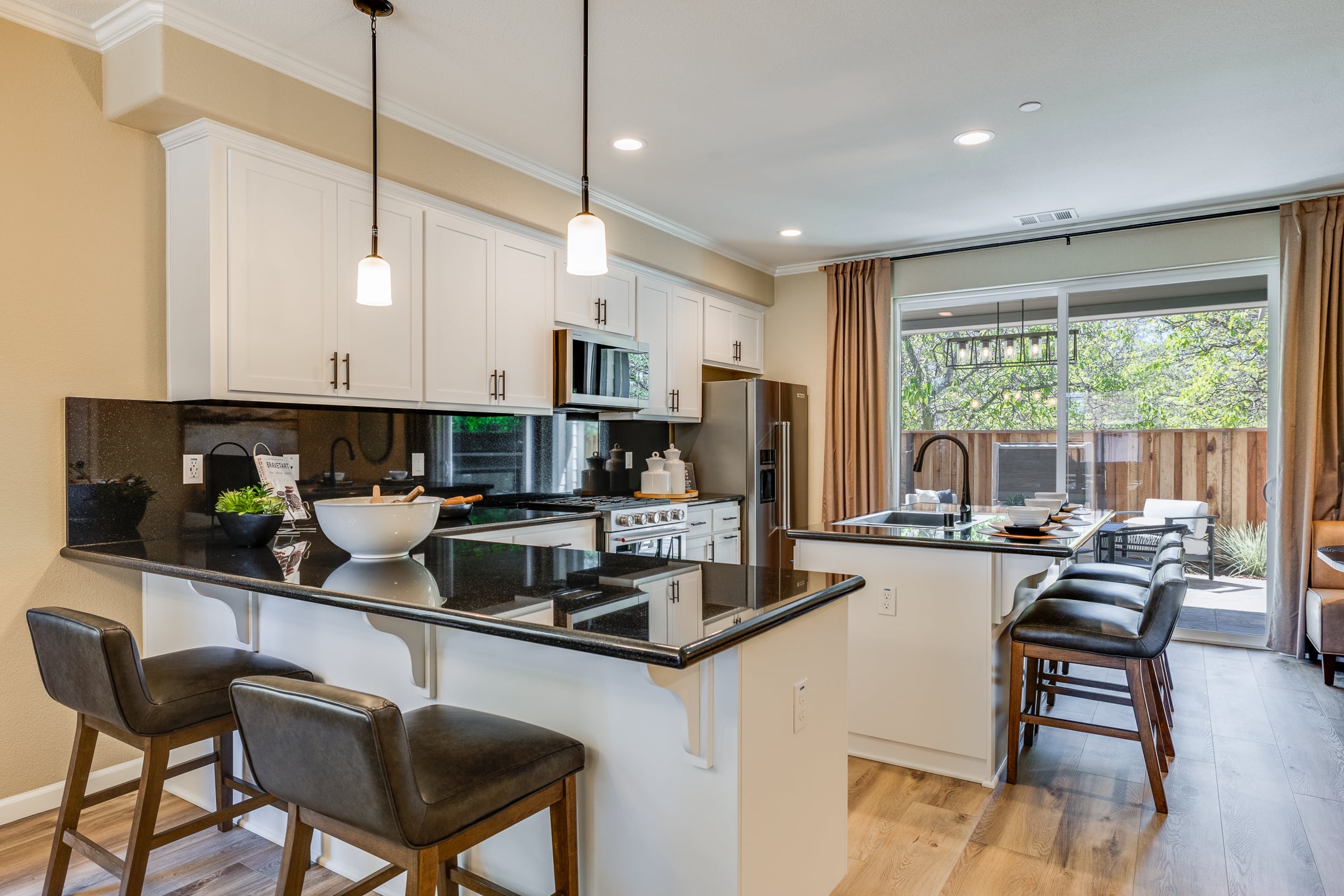 Kitchen inside a new Stone Bridge home at Aspen Park